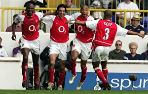 Pires and Vieira: Unstoppable Duo Celebrate Arsenal's Victory Goals vs. Tottenham, FA Premiership 2003-04