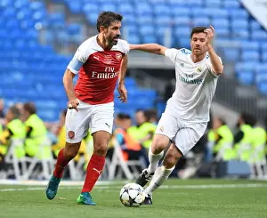 Pires vs. Xavi: A Legendary Clash between Real Madrid and Arsenal