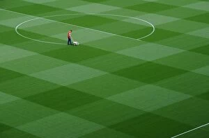 Arsenal Swansea City 2014/15 Collection: Pitch Preparation at Emirates Stadium: Arsenal vs Swansea City (2014/15)