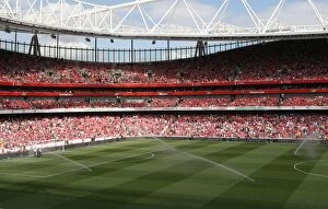 Arsenal v Portsmouth 2009-10 Collection: The pitch is watered before the match