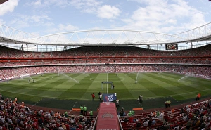 Arsenal v Portsmouth 2009-10 Collection: The pitch is watered before the match