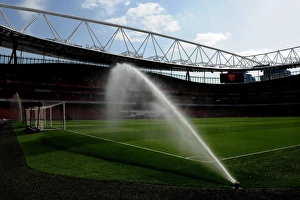 The pitch is watered before the match. Arsenal 4: 0 Watford. Barclays Premier League