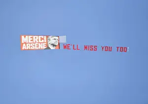 Huddersfield Town V Arsenal 2017-18 Prints: Plane Flies Over Huddersfield Stadium with Arsene Wenger Banner during Arsenal Match