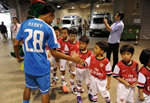 Player Escorts Align before Kitchee FC vs. Arsenal FC Match, 2012
