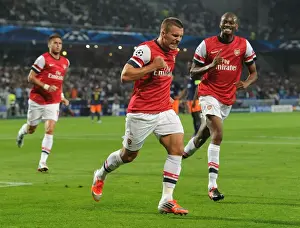 Montpellier V Arsenal 2012-13 Prints: Podolski and Diaby Celebrate Arsenal's First Goal vs Montpellier (2012-13 Champions League)