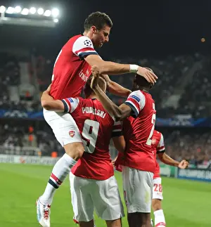Montpellier V Arsenal 2012-13 Prints: Podolski, Diaby, and Giroud: Arsenal's Goal Celebration in Montpellier (2012-13)