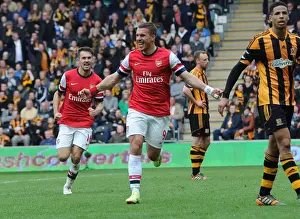 Hull City V Arsenal 2013/14 Prints: Podolski and Ramsey's Epic Goal Celebration: Arsenal's Unforgettable Win Against Hull City (2014)