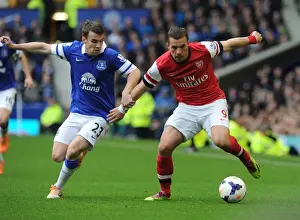 Everton Prints: Podolski vs. Coleman: A Premier League Showdown at Goodison Park