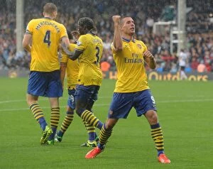 Images Dated 24th August 2013: Podolski's Hat-Trick: Arsenal Triumphs Over Fulham in 2013-14 Premier League