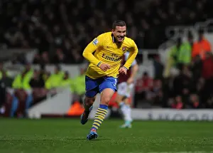 West Ham United V Arsenal 2013-14 Prints: Podolski's Hat-Trick: Arsenal's Dominant Performance Against West Ham United (December 2013)