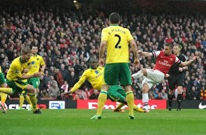 Images Dated 13th April 2013: Podolski's Hat-Trick: Arsenal's Triumph Over Norwich City (April 2013)