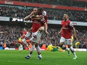 Images Dated 13th April 2013: Podolski's Hat-Trick: Arsenal's Victory Over Norwich City, 2012-13 Season