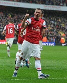 Images Dated 13th April 2013: Podolski's Triumph: Arsenal's Victory over Norwich City (2012-13)