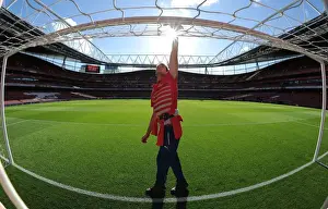 Arsenal V Burnley 2014/15 Prints: Pre-Match Preparation: North Bank Goal Wiped Down at Emirates Stadium (Arsenal vs Burnley)