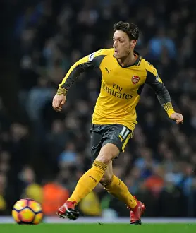 Manchester City V Arsenal 2016-17 Prints: Premier League Battle: Mesut Ozil at Etihad Stadium - Manchester City vs