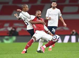 Premier League Showdown: Lacazette vs Fernandinho in Empty Emirates Stadium - Arsenal vs Manchester City (February 2021)