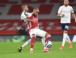 Premier League Showdown: Lacazette vs Fernandinho - Arsenal vs Manchester City (February 2021) - Titans Clash in Empty Stands