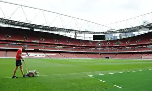 Arsenal V Liverpool 2016-17 Prints: Preparing for the Arsenal-Liverpool Battle: Marking the Emirates Stadium Pitch for Premier League Clash