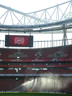 Preparing for the Derby: Arsenal Groundsman Tends to Emirates Stadium Pitch