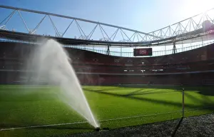 Preparing for the Derby: Arsenal Groundsman Tends to Emirates Stadium Pitch