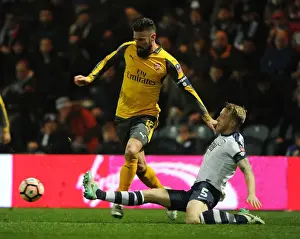 Preston North End V Arsenal - FA Cup - 2017 Prints: Preston North End vs Arsenal: Olivier Giroud Faces Off Against Tom Clarke in FA Cup Clash