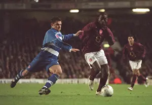 Quincy Owusu-Abeyie (Arsenal) Graeme Murty (Reading). Arsenal 3: 0 Reading