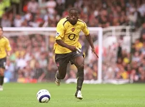 Images Dated 26th September 2005: Quincy Owusu-Abeyie (Arsenal) Nigel Reo-Coker (West Ham)