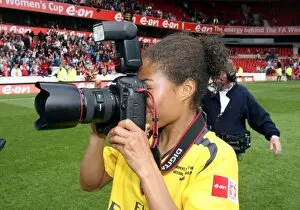 Images Dated 8th May 2007: Rachel Yankey (Arsenal) takes a few pictures after the match