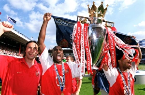 Rami Shaaban, Sol Campbell and Ashley Cole with the Premiership Trophy Rami Shaaban, Sol Campbell and Ashley Cole with the Premiership Trophy