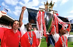 Rami Shaaban, Sol Campbell and Ashley Cole with the Premiership Trophy