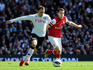 Fulham V Arsenal 2012-13 Prints: Ramsey Closes In: Intense Battle Between Aaron Ramsey and Dimitar Berbatov in Fulham vs Arsenal Premier League Clash