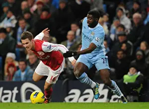 Manchester City V Arsenal 2011-12 Prints: Ramsey Outmaneuvers Toure: A Premier League Battle at Etihad Stadium (2011-12)