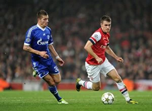 Images Dated 24th October 2012: Ramsey Outruns Neustadter: Arsenal vs Schalke 2012-13 UEFA Champions League
