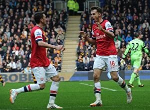 Hull City Collection: Ramsey and Ozil Celebrate Goal: Hull City vs. Arsenal, Premier League 2013/14