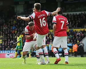 Norwich City V Arsenal 2013-14 Prints: Ramsey and Podolski Celebrate Arsenal's First Goal Against Norwich City (2013-14)
