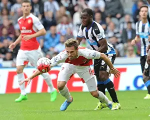 Newcastle United V Arsenal 2015-16 Prints: Ramsey Stands Firm: Arsenal Star Holds Off Newcastle's Anita in Intense 2015-16 Premier League Clash