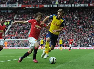 Manchester United V Arsenal 2014-15 Prints: Ramsey vs. Blind: Clash at Old Trafford - Premier League Showdown