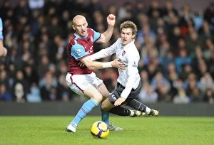 Images Dated 27th January 2010: Ramsey vs. Collins: Stalemate at Villa Park - Arsenal vs. Aston Villa, Barclays Premier League, 2010