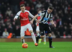 Arsenal V Newcastle United 2015-16 Prints: Ramsey vs Dummett: Intense Battle in the Premier League - Arsenal vs Newcastle United (2015-16)