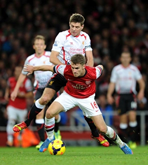 Arsenal V Liverpool 2013-14 Prints: Ramsey vs. Gerrard: Intense Battle at the Emirates, Arsenal vs. Liverpool (2013-14)