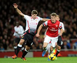 Arsenal V Liverpool 2013-14 Prints: Ramsey vs. Gerrard: Intense Rivalry on the Arsenal-Liverpool Field, 2013-14