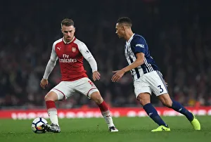 Arsenal V West Bromwich Albion 2017-18 Prints: Ramsey vs. Gibbs: A Rivalry Ignites on the Arsenal Field