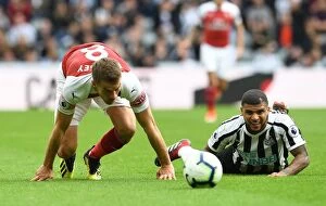 Images Dated 15th September 2018: Ramsey vs. Kenedy: A Premier League Showdown at St. James Park, Arsenal vs