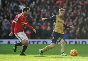Manchester United V Arsenal 2015/16 Prints: Ramsey vs Mata: Intense Rivalry in the Premier League Clash between Manchester United and Arsenal