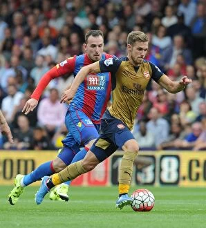 Images Dated 16th August 2015: Ramsey vs Mutch: Battle in the Premier League - Crystal Palace vs Arsenal, 2015