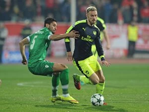 Images Dated 1st November 2016: Ramsey vs. Palomino: A Champions League Showdown - Arsenal's Aaron Ramsey Clashes with Ludogorets