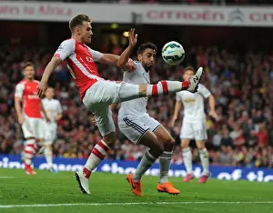 Arsenal Swansea City 2014/15 Prints: Ramsey vs Taylor: A Battle of Wills in the 2014/15 Arsenal vs Swansea Clash
