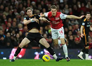 Arsenal V Wolverhampton Wanderers 2011-2012 Prints: Ramsey vs. Ward: Intense Clash Between Arsenal's Aaron Ramsey