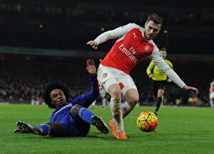 Images Dated 24th January 2016: Ramsey vs. Willian: A Battle in the Arsenal vs. Chelsea Rivalry, Premier League 2015-16