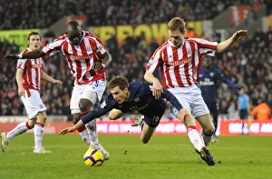 Ramsey's Brilliant Performance: Arsenal Overpower Stoke's Shawcross and Faye (3-1)